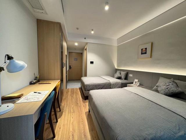 快递小哥保安保洁建设者住进舒适便捷公寓“越来越有家的感觉”(图2)